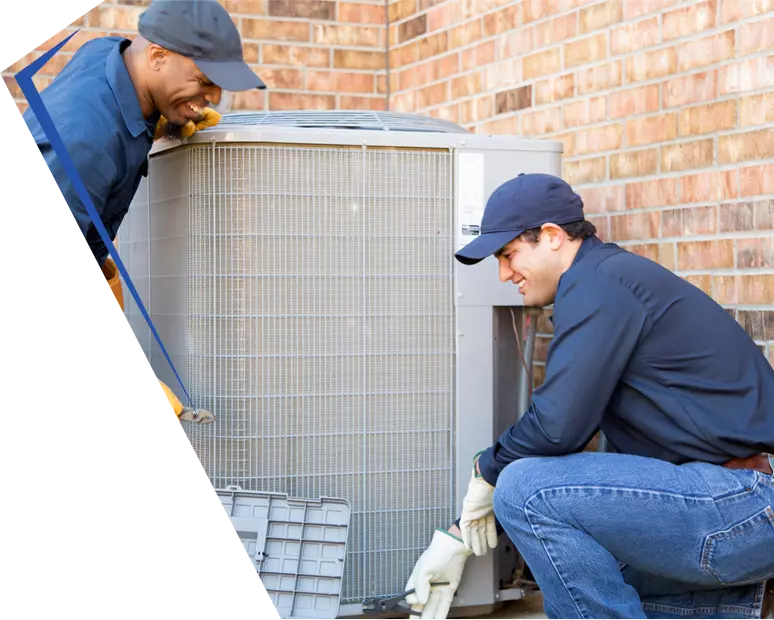 Absolute Tech fixing a heat pump - Absolute Comfort Heating & Cooling in Boring, OR